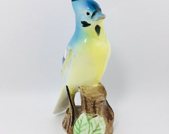 Blue Jay Bird Sitting On A Stump Figurine