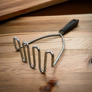 Vintage Metal Potato Masher with Black Handle