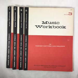 May include: A set of three red and white music workbooks for piano students. The books are titled "Music Workbook" and are numbered 1a, 1b, 2, and 3. The books are published by Summy-Birchard Publishing Company in Evanston, Illinois.