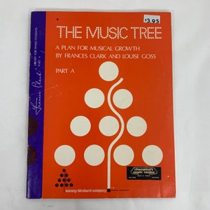 May include: A red book cover with the title "The Music Tree: A Plan for Musical Growth by Frances Clark and Louise Goss, Part A". The cover features a stylized tree with white circles and a white line representing the trunk. The book is published by Summy-Birchard Company.