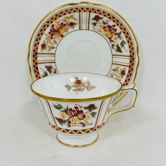 ROYAL CROWN DERBY CLOISONNE TEA CUP AND SAUCER. 