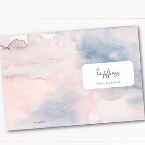 May include: A watercolor-style cover with a soft, blended design in shades of pink and blue. The cover features a white rectangular label with the words "Impfpass" and "Vor-Zuname" in elegant script. The artist's signature is in the lower left corner.