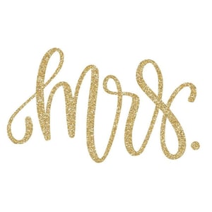 May include: Gold glitter cursive lettering that reads "mrs."