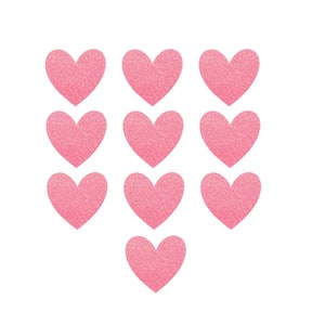 May include: Ten pink glitter heart stickers. The hearts are arranged in a pyramid shape.