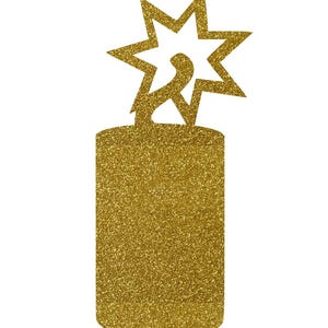 May include: A gold glitter cake topper in the shape of a firecracker with a starburst and the number 2. The topper is designed to be inserted into a cake for a second birthday celebration.