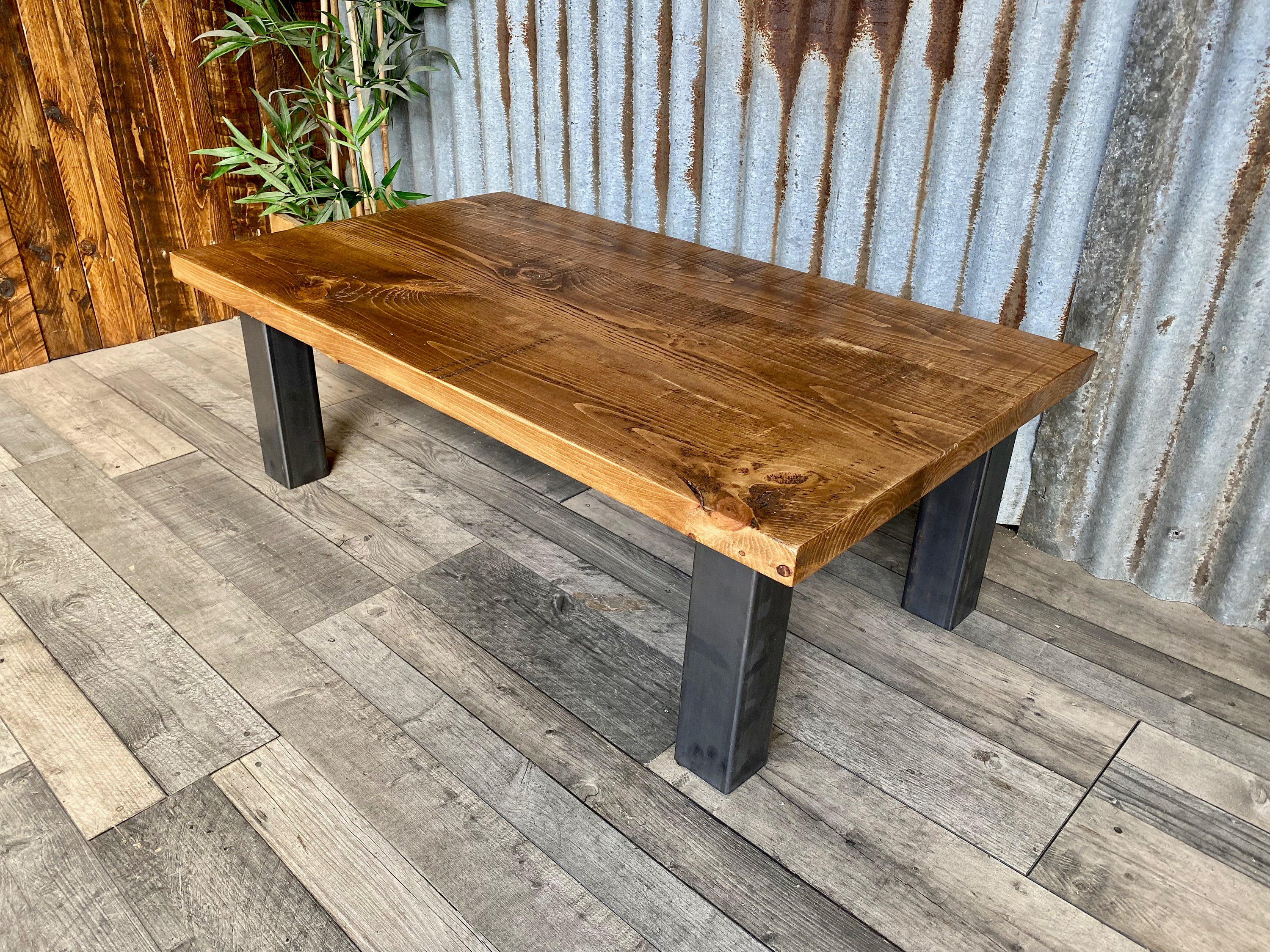 Coffee table rusticindustrial inspired with chunky steel legs, rustic