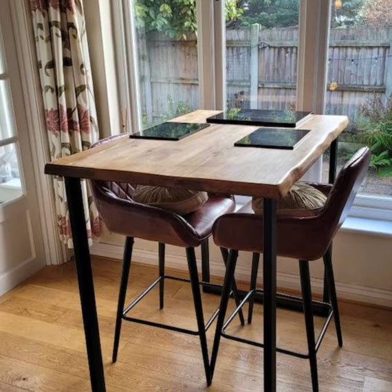 Live edge breakfast bar kitchen table available in a variety of finishes, heights and sizes to create your bespoke table