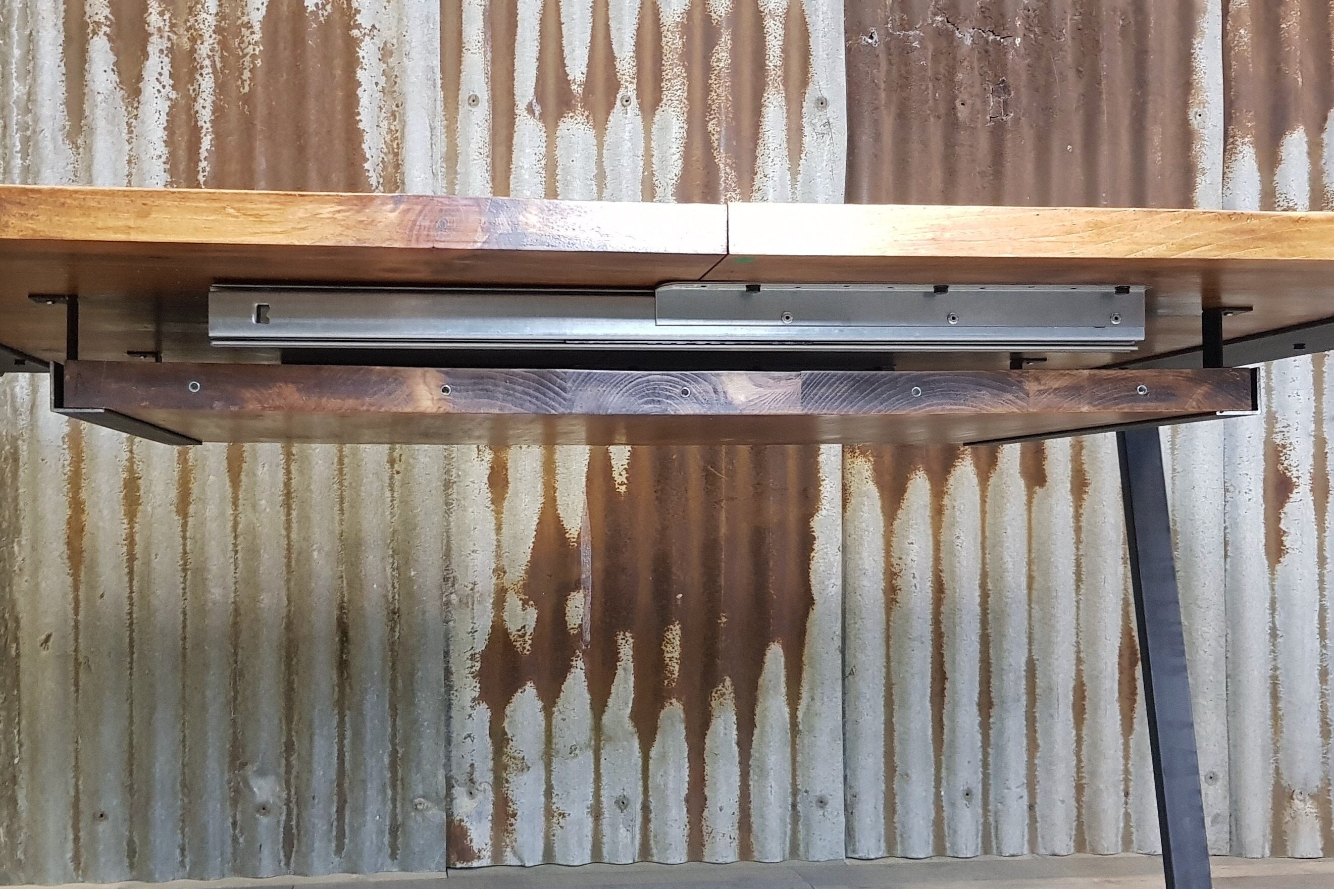 under table extension piece holder for extending dining tables