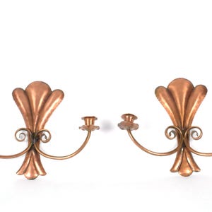 A Pair of Arts and Crafts Copper Candlestick Wall Sconce Lights
