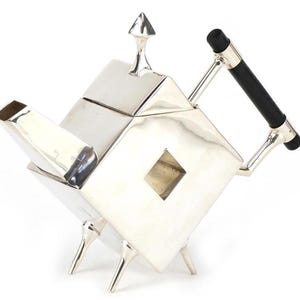 A Large 20th Century Art Deco Silver Plated Christopher Dresser Design Teapot