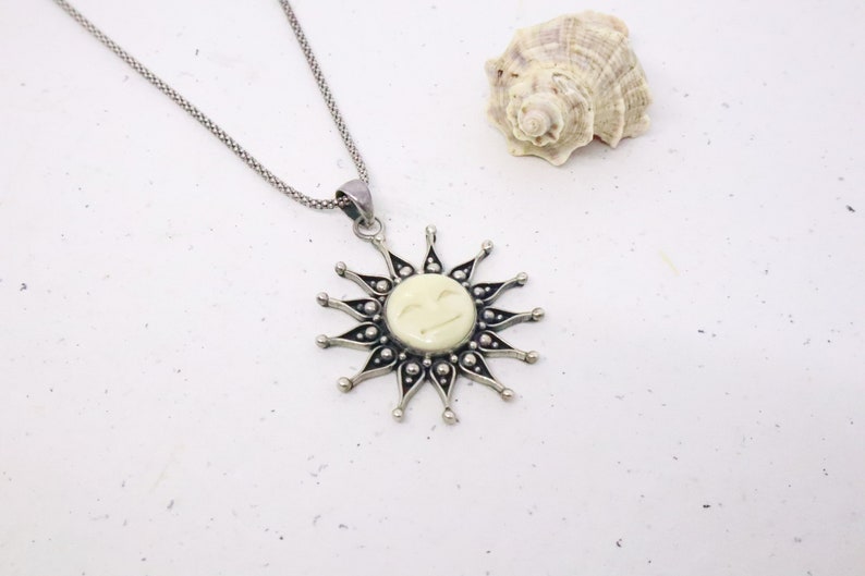 Smiling Beauty Sun Necklace with Bone Pendant