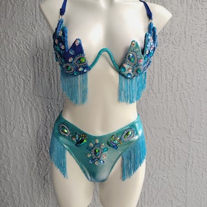 May include: A rustic wooden sign with the text "Welcome to our home" in white lettering. The sign features a distressed finish and a simple, inviting design, perfect for entryway decor.