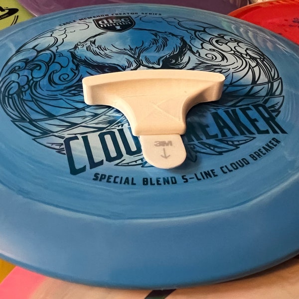 Disc Golf Wall Hanger.  Uses Command Strip (included) for fastener.