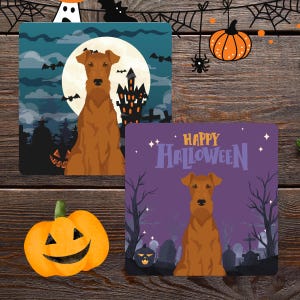 May include: Two square Halloween-themed cards featuring a brown dog. One card has a spooky castle and full moon background. The other card has the text "Happy Halloween" with a graveyard scene. An orange pumpkin with a carved face is also present.