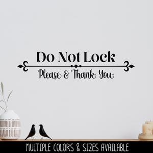 May include: Black and white vinyl decal with the text "Do Not Lock Please & Thank You" with decorative flourishes on either side.  Multiple colors and sizes are available.
