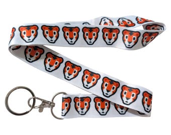 Porte-clés blanc avec tête de tigre