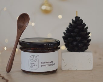 Valentines day gift set with a pine cone jam, a wax candle and wooden spoon