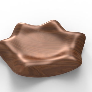 Pode incluir: Uma tigela de madeira com um formato orgânico único. A tigela é feita de madeira castanho escura com um acabamento liso e polido.