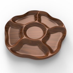 May include: A wooden serving tray with five separate compartments. The tray is brown and has a wavy edge.