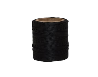 May include: A spool of black waxed thread.
