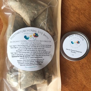 May include: A pack of eight organic herbal healing sitz bath bags for postpartum recovery. The pack is labelled with instructions for use and a list of ingredients. A small silver tin of salve for perineal postpartum recovery is also pictured. The tin is labelled "Peri Potion" and has a 2 oz size.