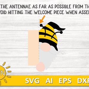 May include: A digital cut file design of a bee gnome with a black hat and yellow and black striped body. The design includes the text "PLACE THE ANTENNAE AS FAR AS POSSIBLE FROM THIS LINE TO AVOID HITTING THE WELCOME PIECE WHEN ASSEMBLING".