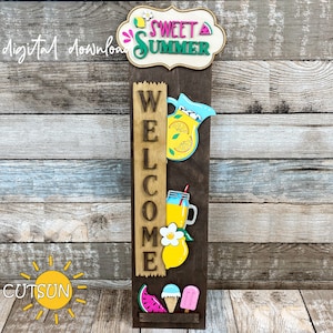May include: A wooden welcome sign with the words "Sweet Summer" and "Welcome" in a decorative font. The sign is decorated with images of lemons, lemonade, watermelon, and ice cream.