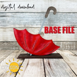 Peut inclure: Un parapluie en bois rouge avec une poignée argentée, posé sur une base en bois. Le texte "BASE FILE" est visible sur l'image.