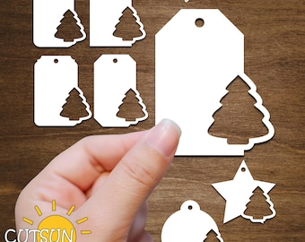 Peut inclure: Un ensemble de six étiquettes cadeaux de Noël blanches avec un motif d'arbre simple. Les étiquettes sont parfaites pour ajouter une touche festive à vos cadeaux. Les étiquettes sont des téléchargements numériques, vous pouvez donc les imprimer à la maison.