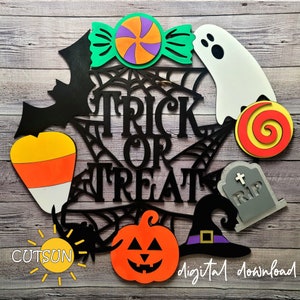 Könnte beinhalten: Ein schwarzes und weißes Spinnennetz-Design mit den Worten "Trick or Treat" in Schwarz. Es gibt verschiedene Halloween-Schnitte, darunter ein Mais, ein Geist, eine Fledermaus, ein Kürbis, ein Hexenhut, ein Bonbon und ein Grabstein mit dem Wort "RIP" darauf.