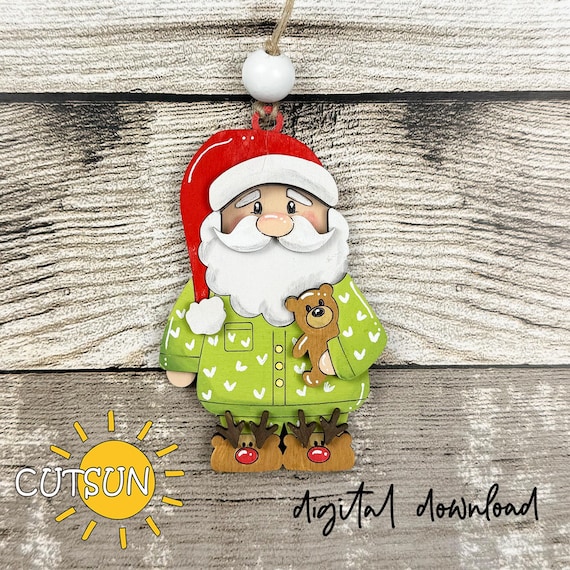 Santa Ornament SVG | Cute Christmas Santa in Pajamas Laser Cut File | Pajama Santa with Teddy Bear | Reindeer Slippers