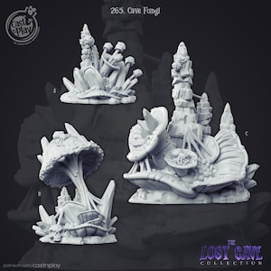 May include: Three 3D printed miniature cave fungi sculptures. Each sculpture features a different design with a mushroom-like structure, crystals, and a rock formation. The sculptures are white and are part of a collection called "The Lost Cave Collection."