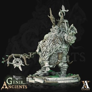 May include: A detailed miniature figurine of a gray-toned, bearded, and horned creature holding a staff with a circular symbol. The figurine is standing on a base with green moss and is part of the "Nature's Wrath Genir Ancients" collection.