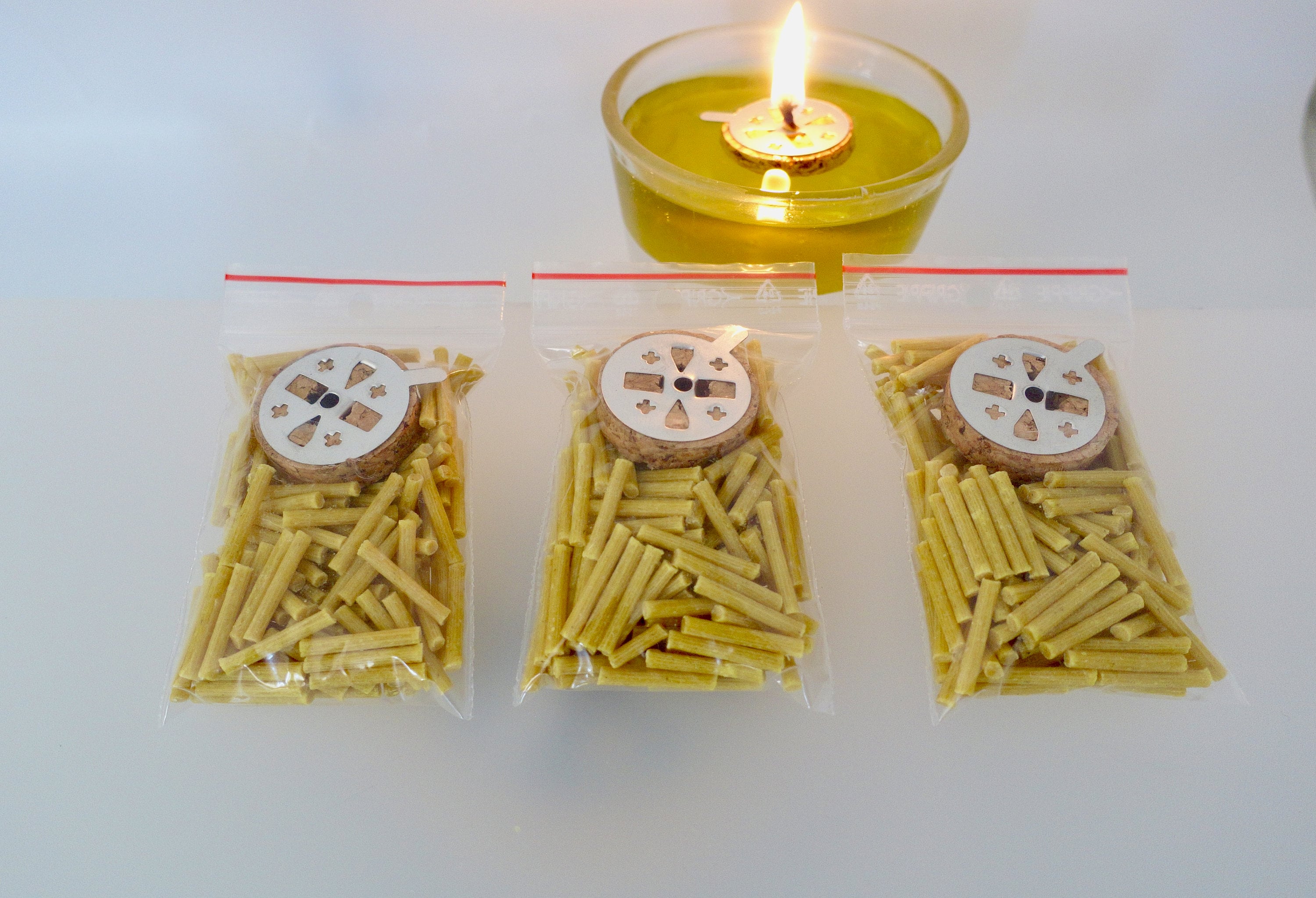 Here's a really quick and simple way to make a floating-wick oil