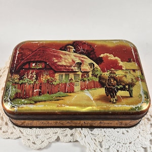 Vintage Blue Bird Toffee tin; made in England decorative tin with thatched cottage village scene Take the Home Sweet Home Harry Vincent Ltd