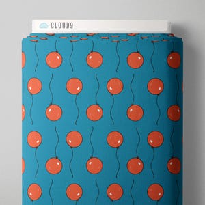 May include: Teal fabric with a repeating pattern of red balloons with black strings. The fabric has the text "CLOUD9" printed on it.
