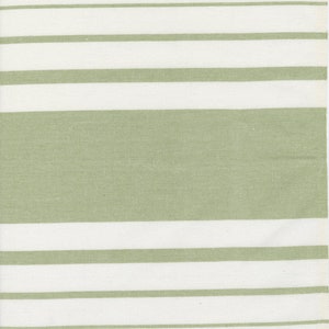 May include: A white kitchen towel with green stripes. The towel has a subtle texture and a woven look.
