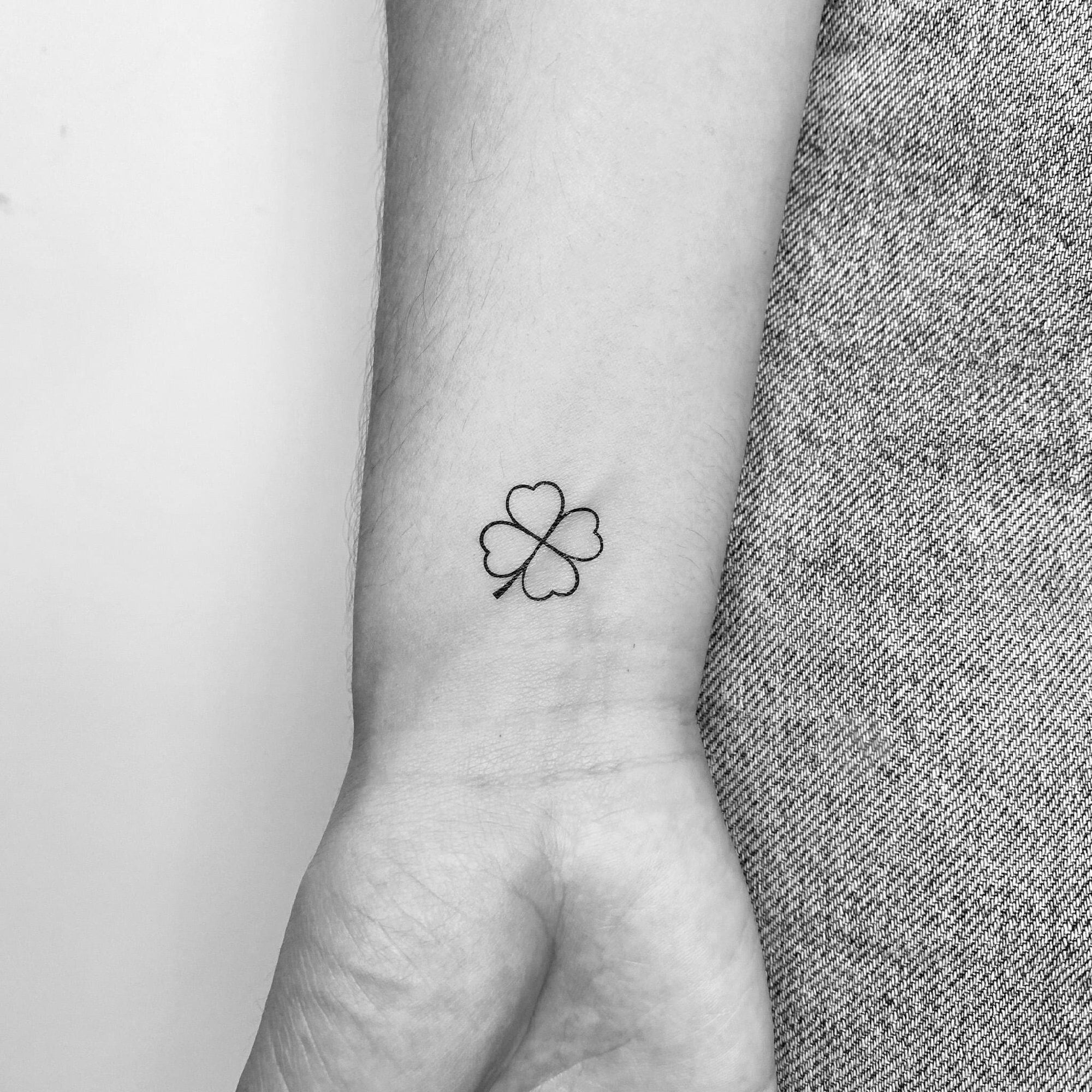 Small Black Four Leaf Clover Tattoo Idea