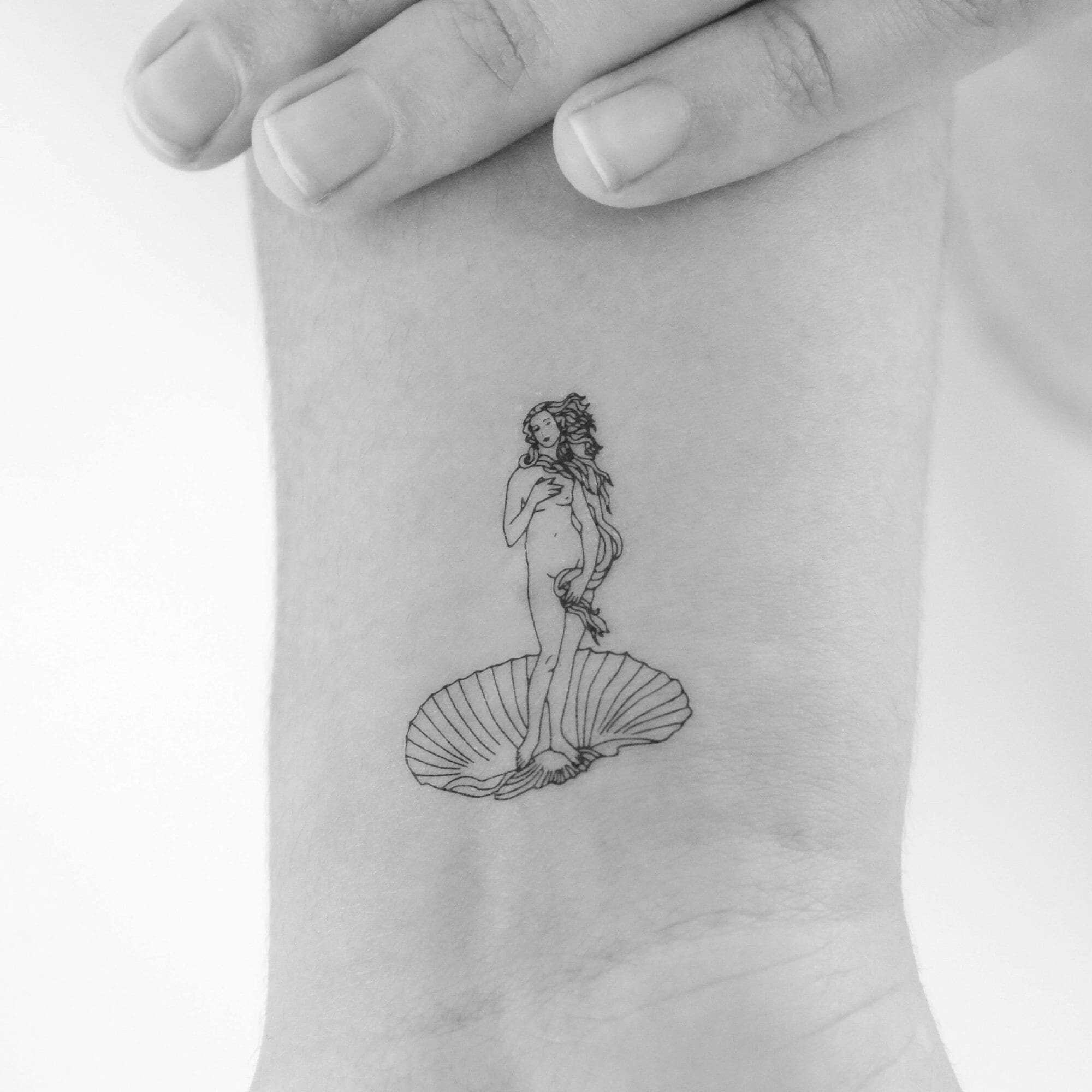 Tattoo tagged with: feminist, small, micro, tiny, planet symbol, ifttt,  little, evankim, astrology, wrist, minimalist, other, venus symbol |  inked-app.com