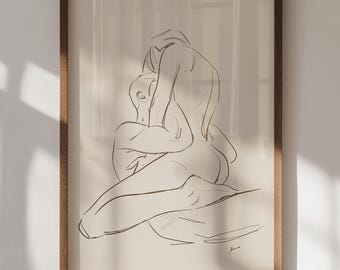May include: A framed art print featuring a minimalist line drawing of two figures embracing. The artwork is rendered in black lines on a cream-colored background, encased in a wooden frame. The piece evokes themes of intimacy and connection.