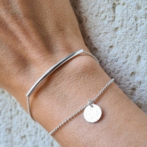 925 Silver Double Row Bracelet with its curved tube and hammered charm