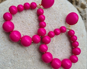 Trendy Vintage style earrings in Fuchsia colored resin beads