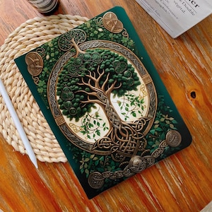 May include: A green and gold Celtic tree of life design with intricate knotwork and swirling patterns. The tree is surrounded by leaves and vines.