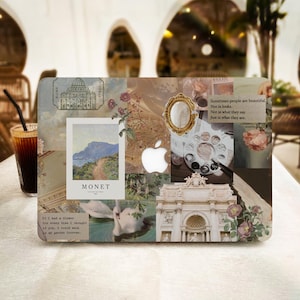 Può includere: Un laptop con un collage di immagini, tra cui un dipinto di Monet, un cigno, un edificio e una citazione sulla bellezza. Il laptop ha uno sfondo bianco e una tastiera nera.