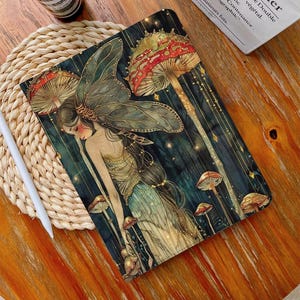 May include: A dark blue and green illustration of a fairy with wings, long hair, and a flowing dress. The fairy is surrounded by glowing mushrooms and a starry sky.