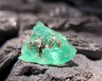 Natural Green Emerald Rough with Black Crystal, 0.95 Carats