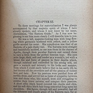 May include: Aged paper page from a book titled "A Wanderer in the Spirit Lands." The text includes the chapter title "Chapter XI" and descriptive text about a figure. The page is aged with a sepia tone.