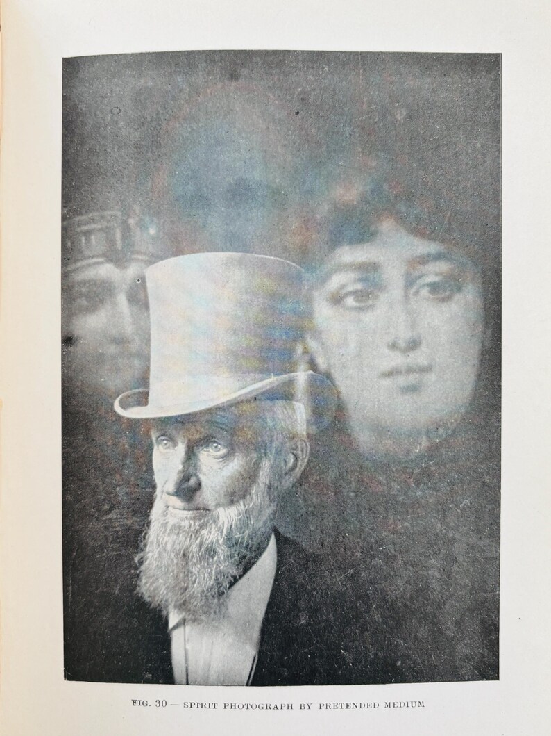 May include: A vintage black and white spirit photograph. It depicts a man with a top hat and a long white beard, with a woman's face ghosted behind him. The text at the bottom reads "FIG. 30 - SPIRIT PHOTOGRAPH BY PRETENDED MEDIUM."