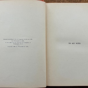May include: An open book with text on the pages. The left page has text that reads "Entered according to Act of Congress, in the year 1897. By WILLIAM H. LEE. In the office of the Librarian of Congress, at Washington, D.C. Copyright, 1897, by WILLIAM H. LEE." The right page reads "TO MY WIFE."