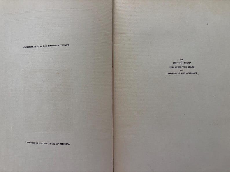 May include: The open pages of a book featuring black printed text on off-white paper. The left page displays copyright information for J. B. Lippincott Company, 1924. The right page contains a dedication to Cond&eacute; Nast for ten years of guidance.